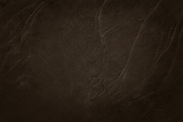Dark brown slate stone texture in natural pattern with high resolution for background and design art work.