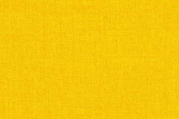 Yellow linen fabric cloth texture background, seamless pattern of natural textile.