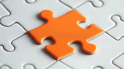 Fototapeta premium A solitary, vivid orange puzzle piece sits prominently on a clean and minimalistic white puzzle background