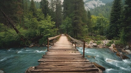 Fototapeta premium Concept of a wooden bridge over a river in the mountains
