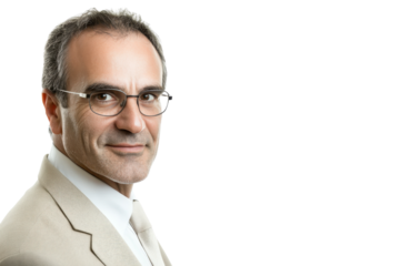 Confident mature businessman in glasses and beige suit, smiling at camera. Professional portrait, isolated on transparent background.