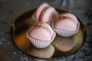 Pink macaroon dessert, original and stylish dessert. Closeup.