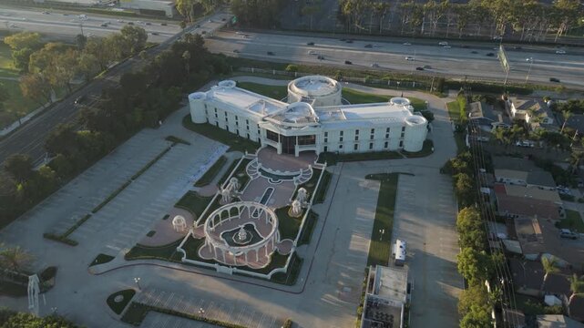 Trinity Broadcasting Network headquarters with street view behind it in Costa Mesa, California, US