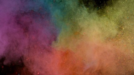 Colored powder dust abstract background . Freeze motion.