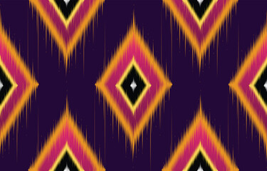 Trendy boho pattern boho featuring vibrant zigzag and diamond shapes. Colorful bohemian boho design on deep purple background. Ethnic textile print for fashion, home decor. wallpaper. Aztec-style.