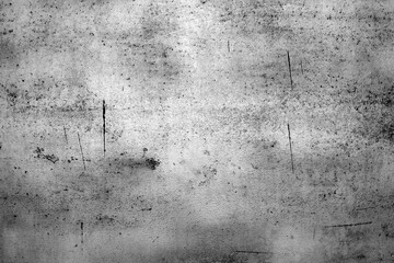 Scratched and weathered metal plate surface.