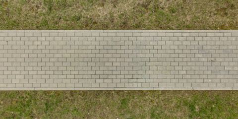 top view of surface of paving slabs and pedestrian footpath