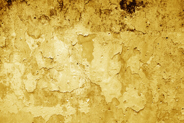 Peeling paint on grungy plaster wall. Orange style.