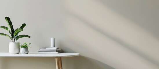 desk with plants and books, overlooking the sea through large windows. Web banner with copyspace