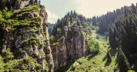 Almaty gorge with Butakovsky waterfall at the end, Butakovsky gorge in the mountains of Almaty with a beautiful waterfall at the end
