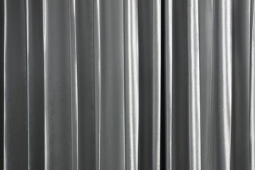 Obraz premium background photo of nice metallic texture silver metalic color curtain in the luxury bedroom of the luxurious hotel before cleaning process for available booking from guests