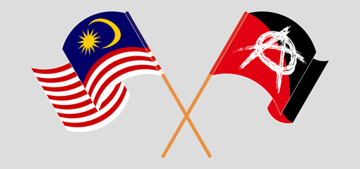 Crossed and waving flags of Malaysia and Anarchy