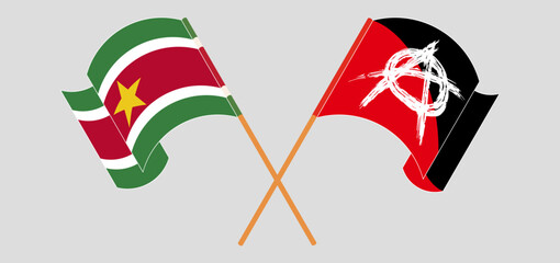 Crossed and waving flags of Suriname and Anarchy