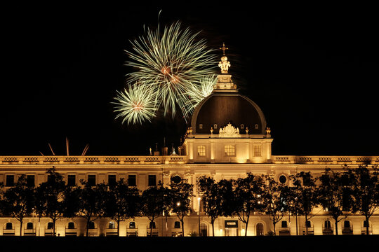 Bastille Day fireworks over Grand Hotel-Dieu. Lyon, France.