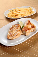 grilled chicken fillet with fries
