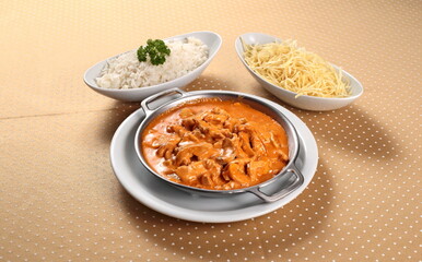 Chicken Stroganoff with white rice and French fries