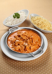 Chicken Stroganoff with white rice and French fries
