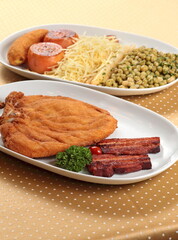 Cuban Chicken Supreme with tomatoes, bacon and fried banana