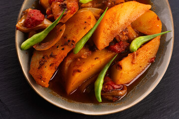 fried potatoes with paprika sauce. crispy fried patata bravas, fried potatoes with smoked paprika sauce