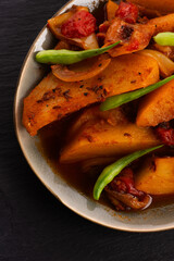 fried potatoes with paprika sauce. crispy fried patata bravas, fried potatoes with smoked paprika sauce