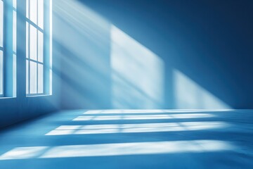 Obraz premium Sunlit Serenity: A minimalist blue room bathes in the ethereal glow of sunlight streaming through tall windows. 