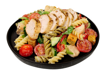 Chicken and pasta salad meal with roasted chicken breast isolated on a white background