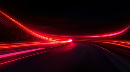 A dynamic display of vibrant red and pink light trails on a dark road, suggesting speed and motion.