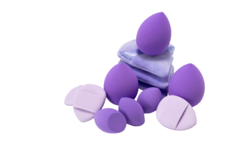 Kit of purple beauty make-up sponges on transparent background. Make-up concept