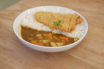Katsu Curry with Rice with wooden table