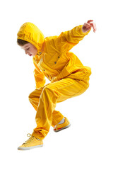 Full length profile shot of a boy in a yellow skateboard outfit doing a kick-flip Isolated on transparent background.