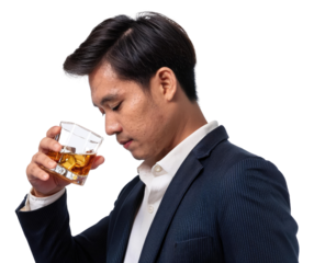 A thoughtful man in a suit holding a glass of whiskey, reflecting on life amidst a stylish atmosphere.