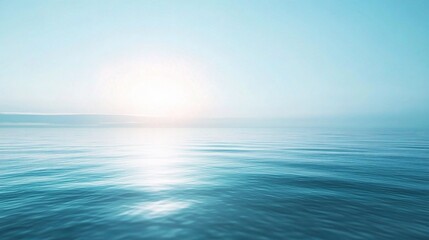 Fototapeta premium Azure Serenity: A minimalist seascape bathed in the tranquil glow of a hazy sunrise over a glassy ocean, inviting reflection and peace. 