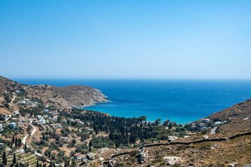 Fototapeta premium Gialia Beach in Andros island, Greece. Clear sea water and blue sky, view from above.