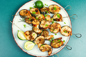 Mackerel fish on skewers.