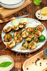 Grilled mackerel fish, fish skewers.