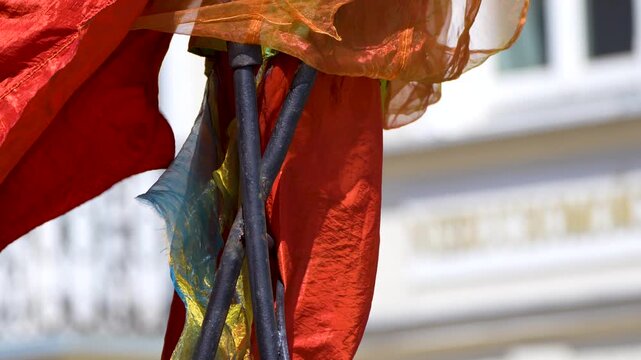 red and white cloth at the parade