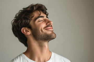 Fototapeta premium A close up of a man's face with his eyes closed