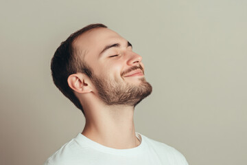 Fototapeta premium A close up of a man's face with his eyes closed