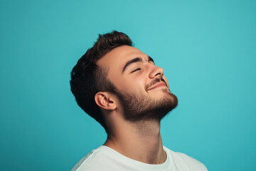 Obraz premium A close up of a man's face with his eyes closed