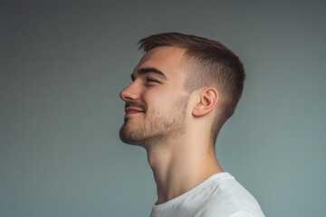 Obraz premium A close up of a man's face with his eyes closed