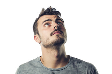 Obraz premium A man is in deep thought, eyebrows furrowed in concentration, isolated on white background.