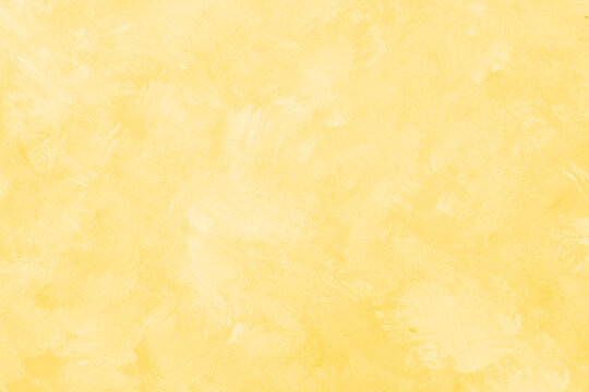 Painted light yellow background or texture, plaster, part of the wall, abstract wallpaper for design