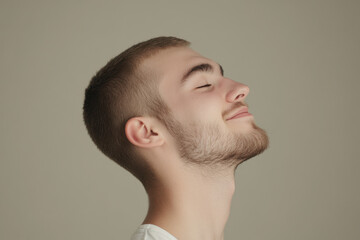 Obraz premium A close up of a man's face with his eyes closed
