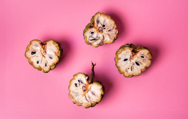 Custard apple on pink background