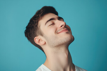 Obraz premium A close up of a man's face with his eyes closed