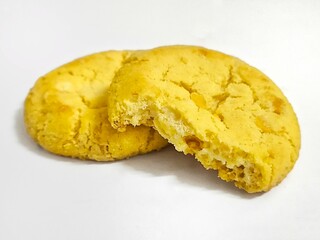 Crunchy lemon and white chocolate cookie isolated on white background. Sweet dessert