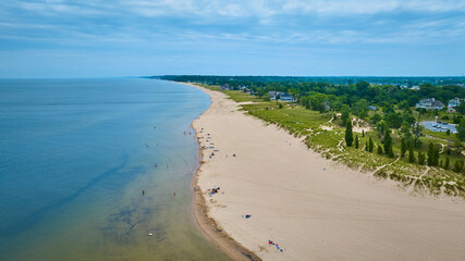 Aerial View of Serene Beach and Coastal Community
