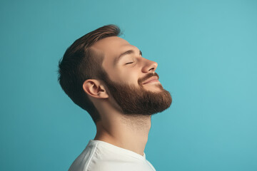 Obraz premium A close up of a man's face with his eyes closed