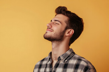 Obraz premium A close up of a man's face with his eyes closed