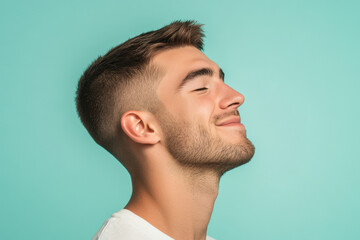 Obraz premium A close up of a man's face with his eyes closed